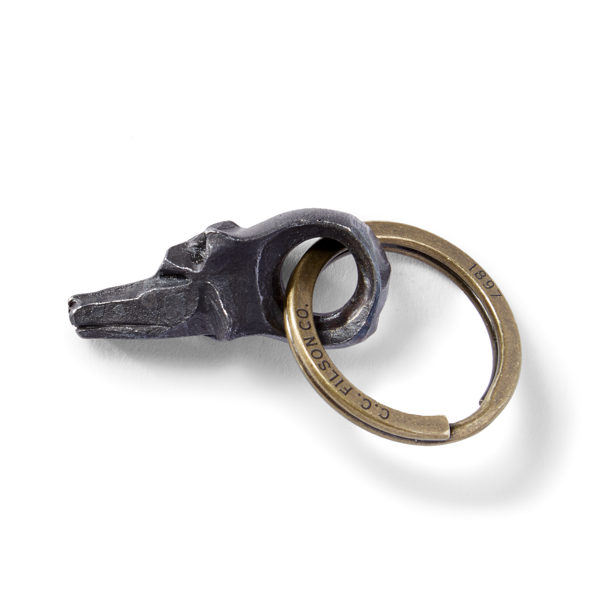 Front-facing image of the Filson Wolf Head Short Key Fob - Steel