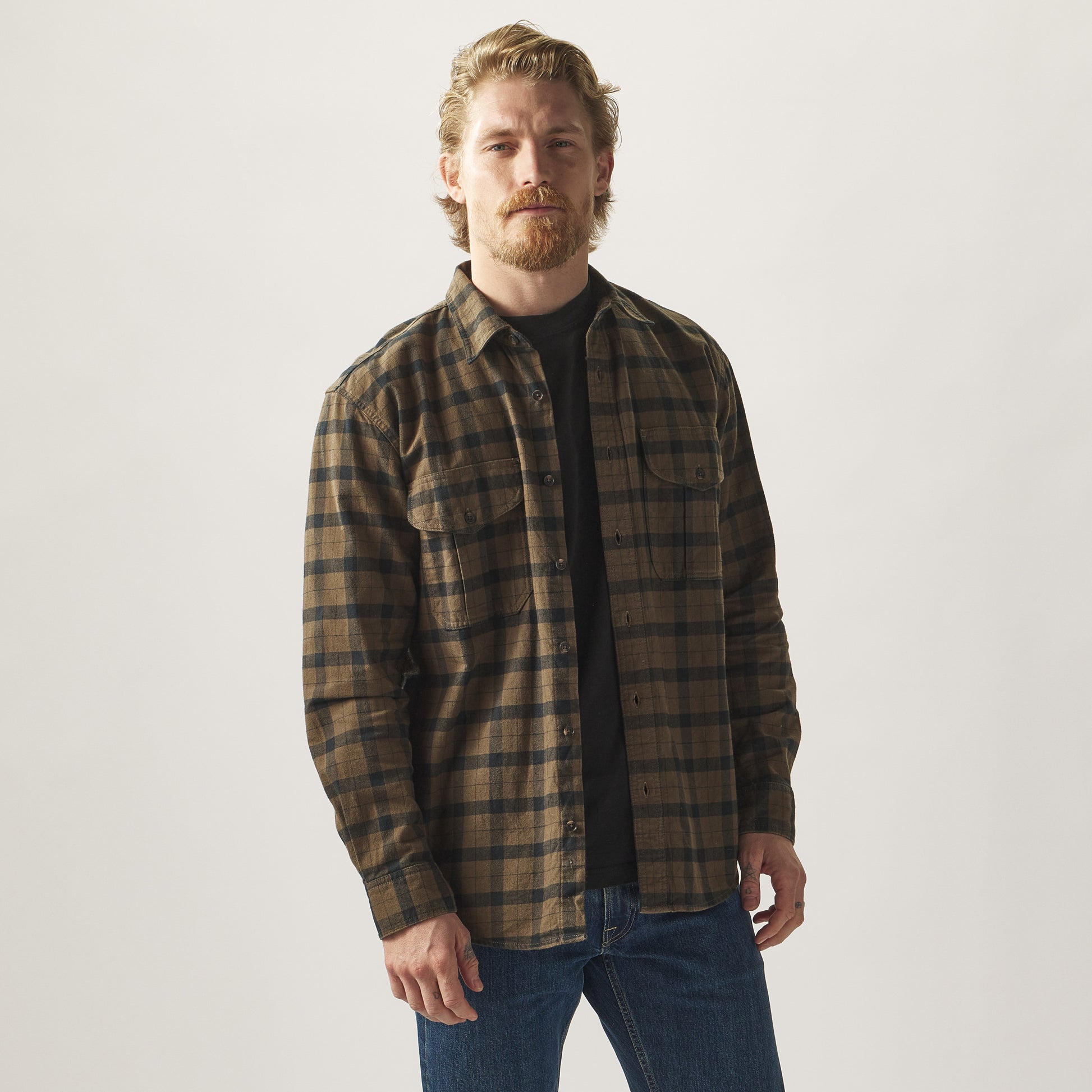 Model wearing a Filson Alaskan Guide Shirt.|Model is 6'1", 185 lbs wearing a size medium