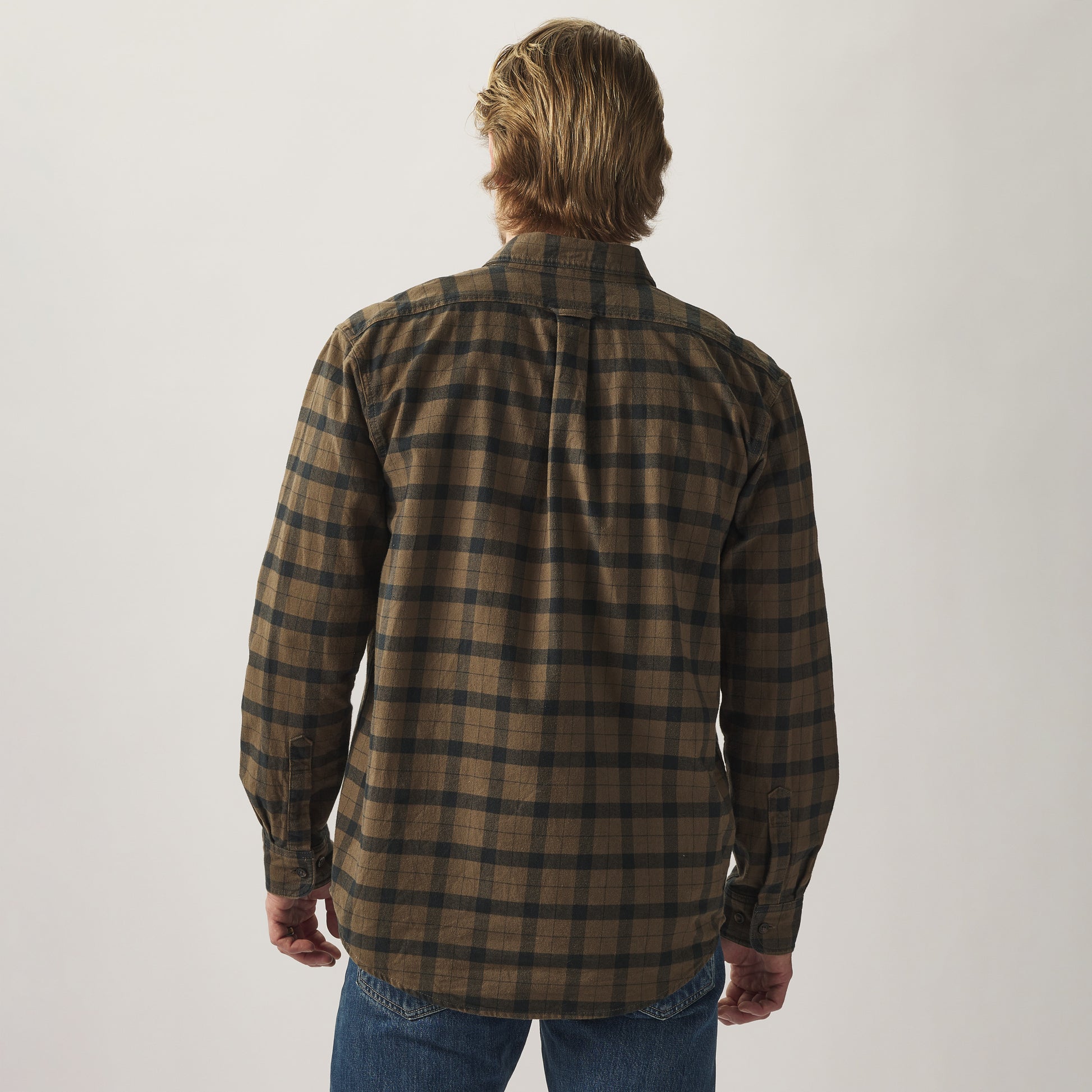 Model wearing a Filson Alaskan Guide Shirt.|Model is 6'1", 185 lbs wearing a size medium